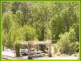 Picnic table and fire pit near the Bullion Creekside Retreat near Marysvale Utah and the Paiute Trail.